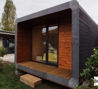 Half-covered wooden terrace of the Room StopEtape Fecht accommodation, of the Médiéval campsite labelled cycling home in Turckheim