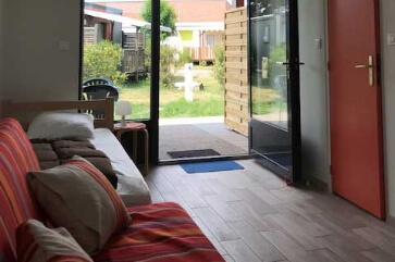 Bright room with access to an outdoor space facing South-West, of the Room StopEtape Obschel accommodation, of the Médiéval campsite labelled cycling home in Alsace